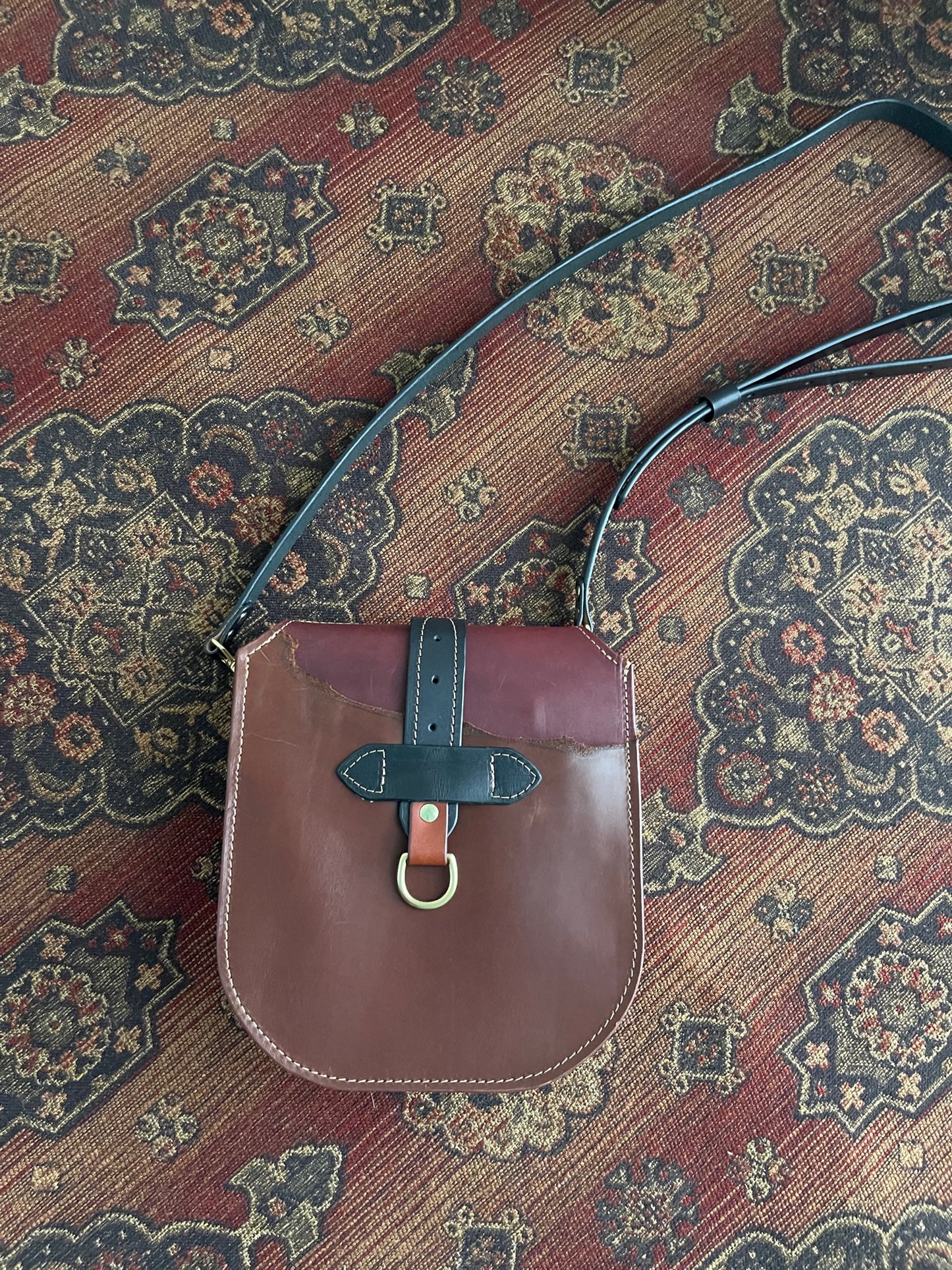 Echo with Black Strap and Brass D rings