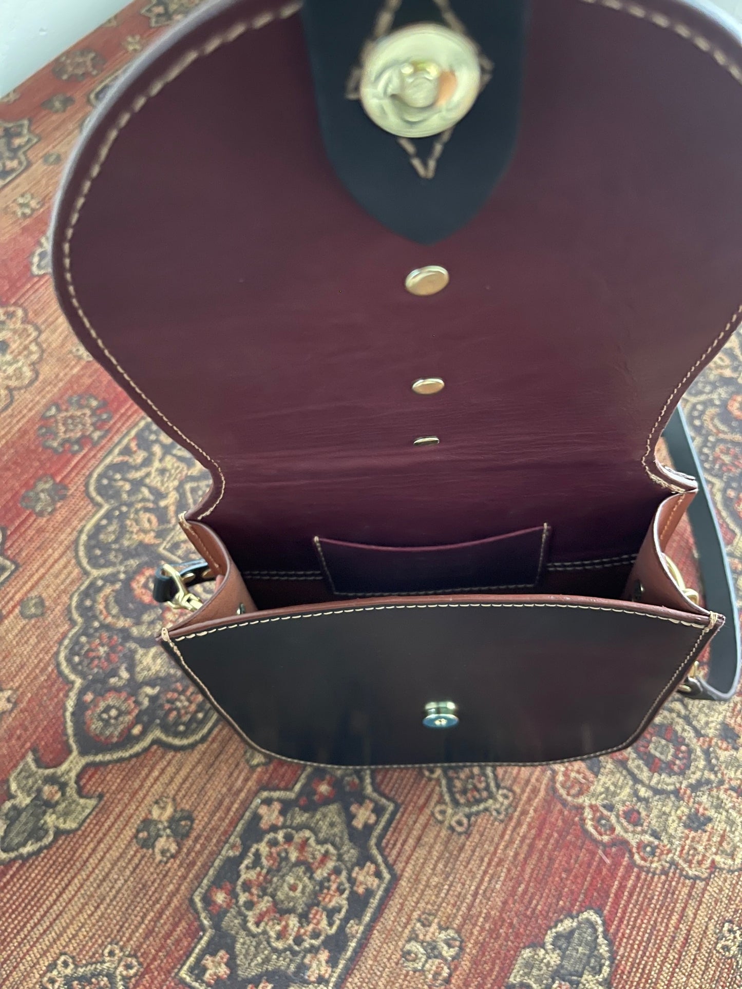 Echo with Black Strap and Brass D rings