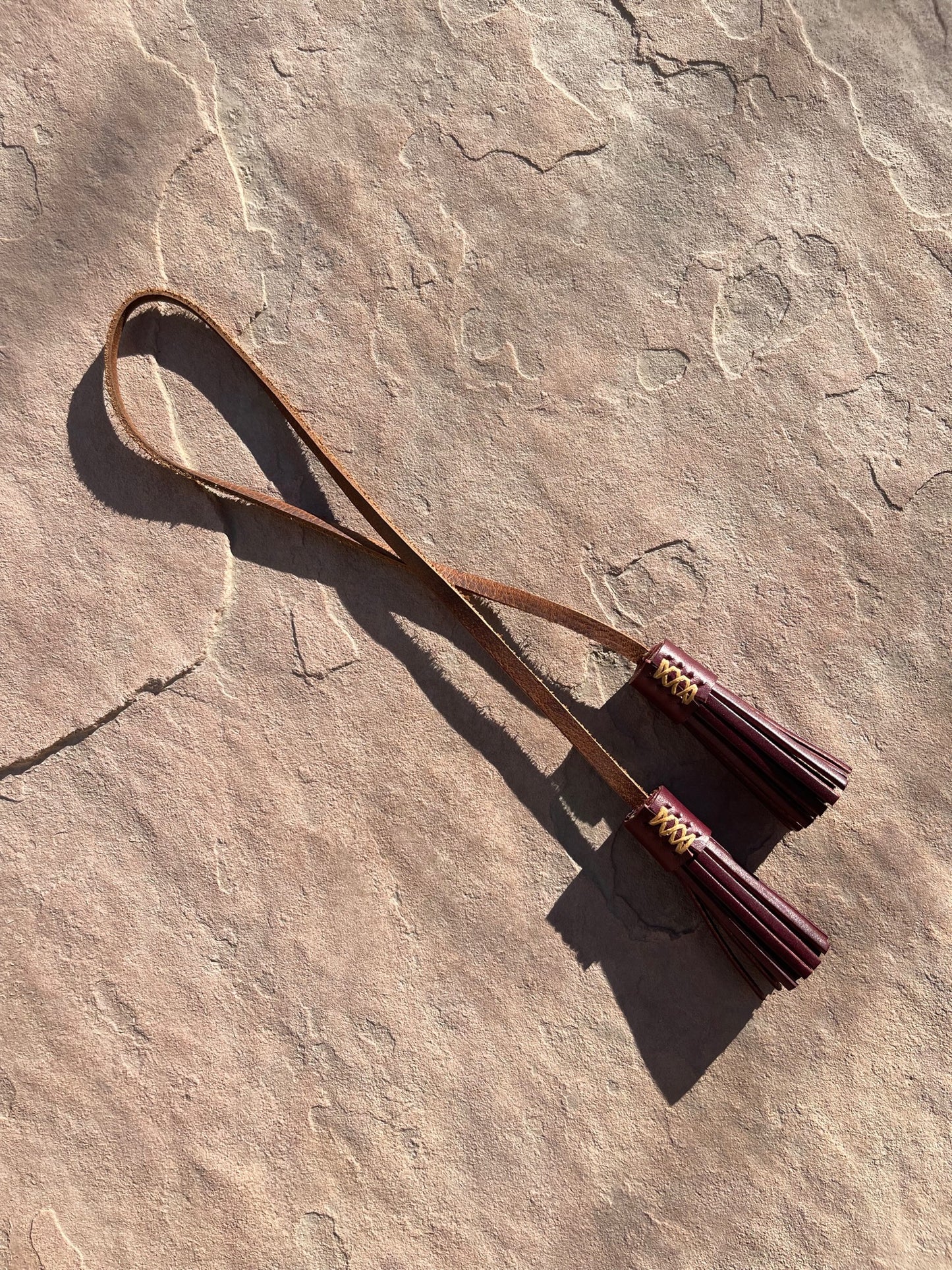The Mira Tassel Charm