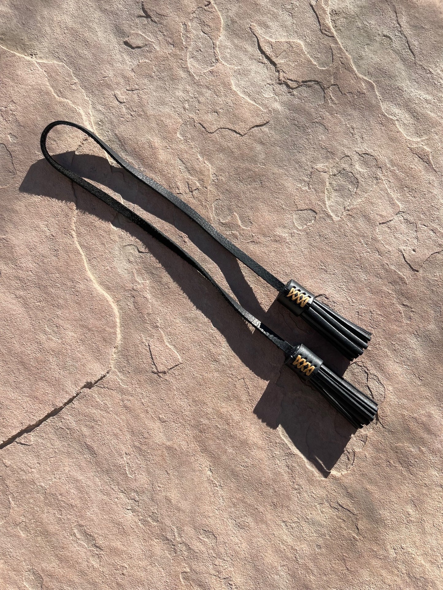 The Mira Tassel Charm