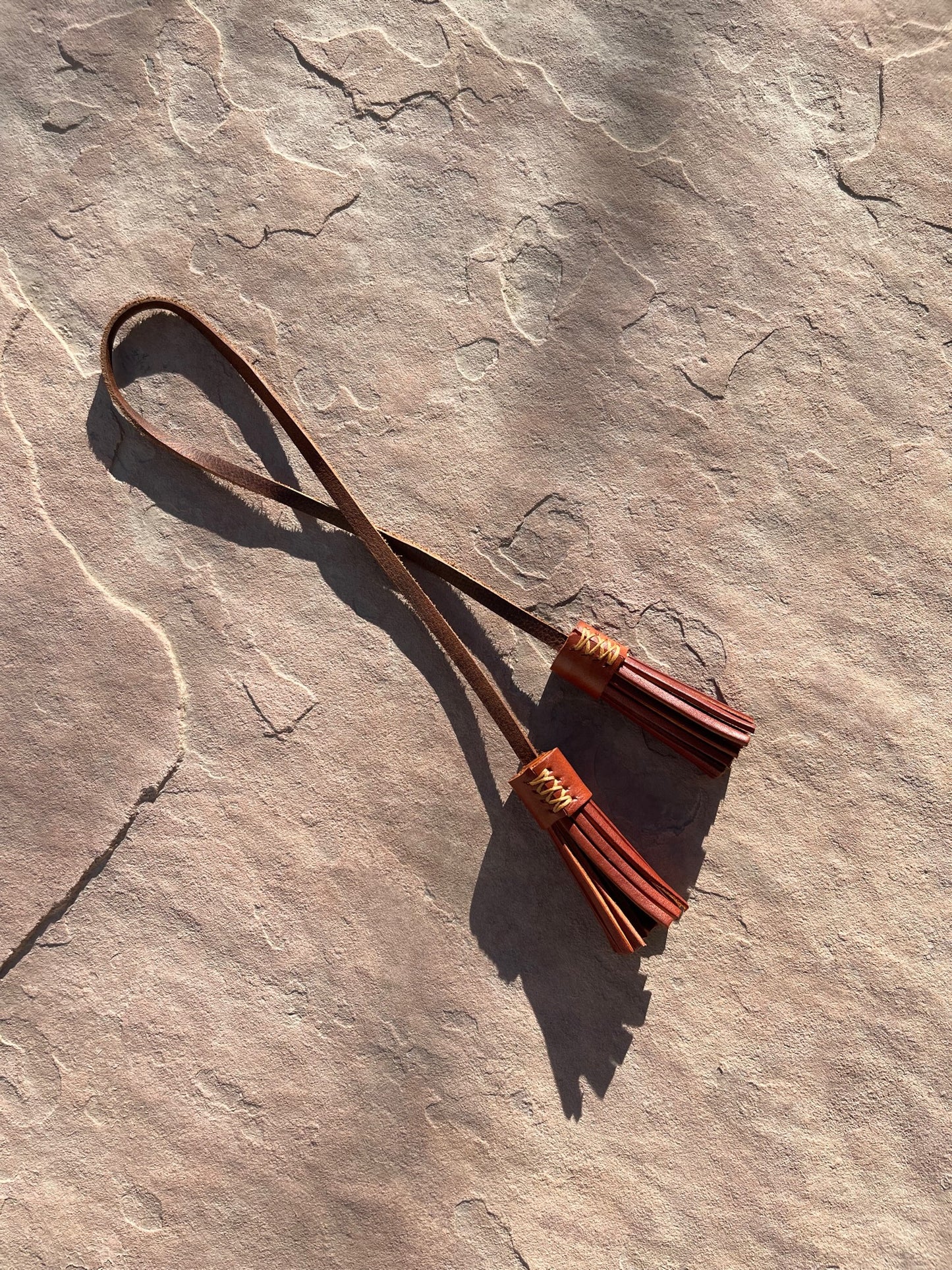 The Mira Tassel Charm