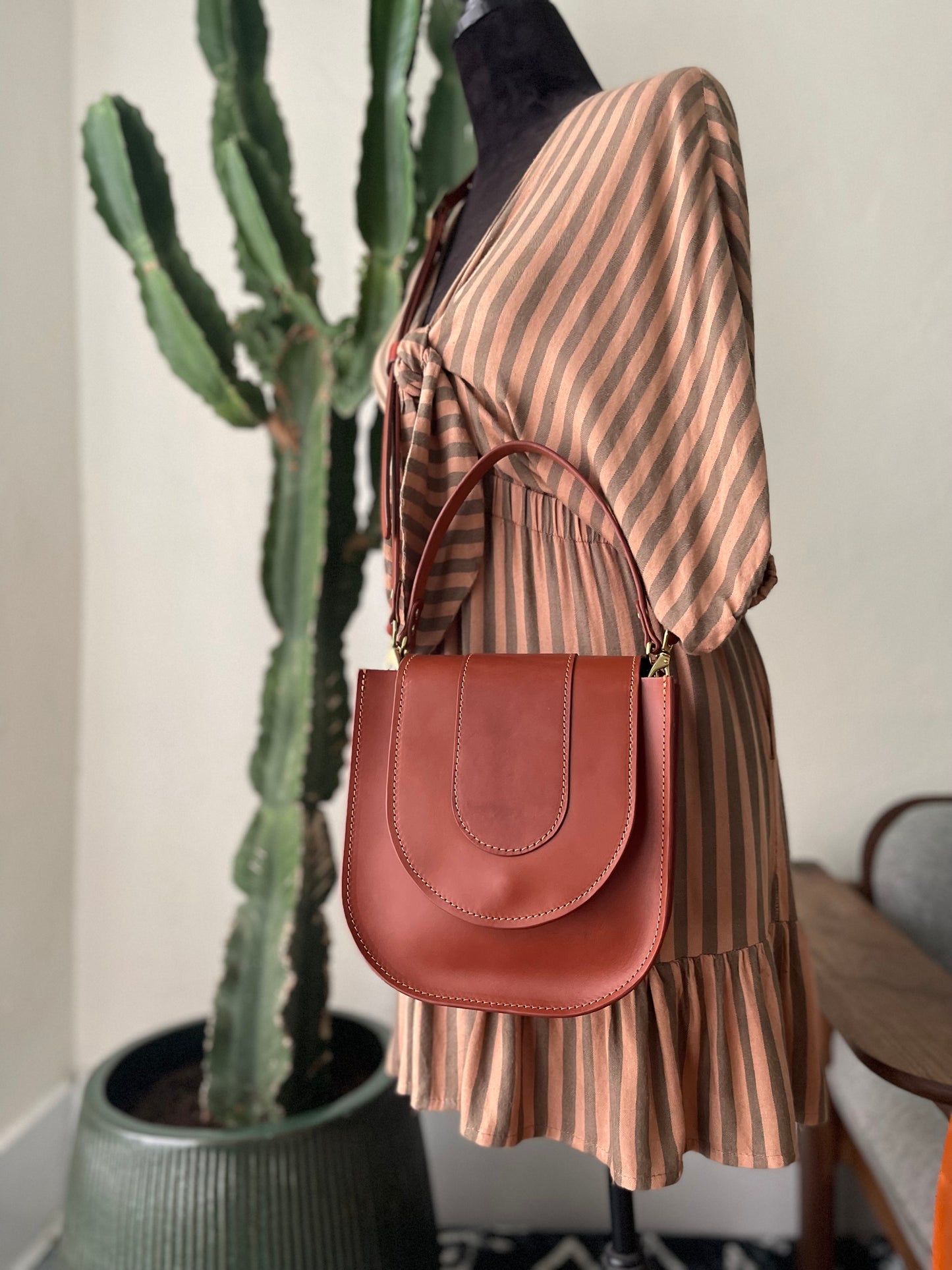 Echo Crossbody in Cognac Sample
