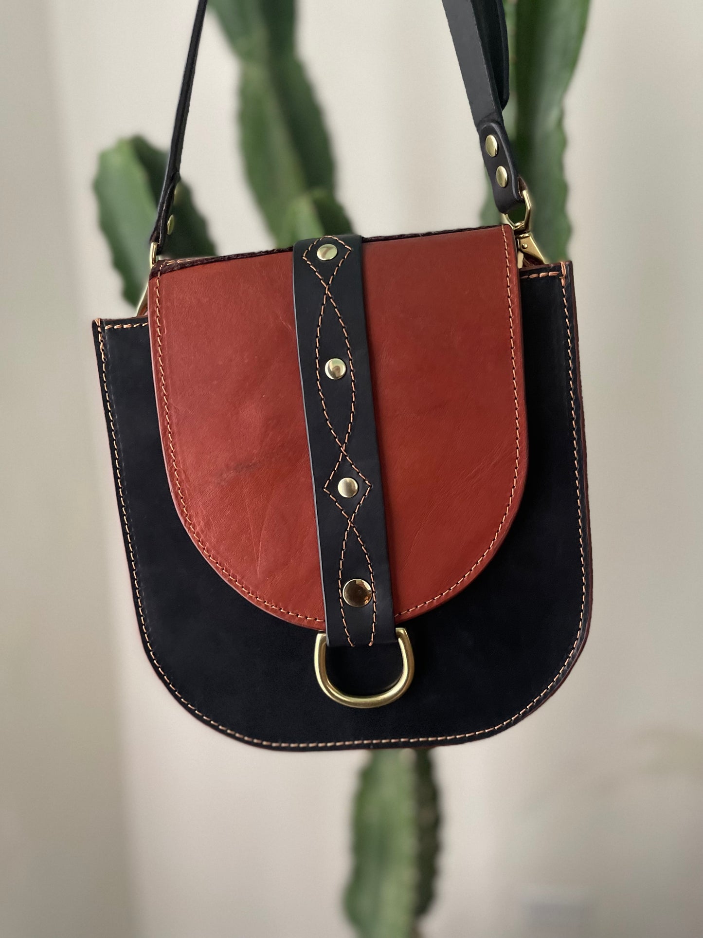 Echo with Black Strap and Brass D rings