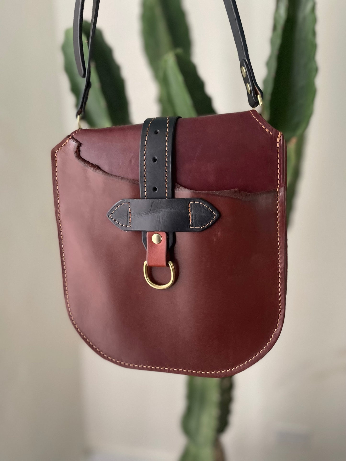 Echo with Black Strap and Brass D rings